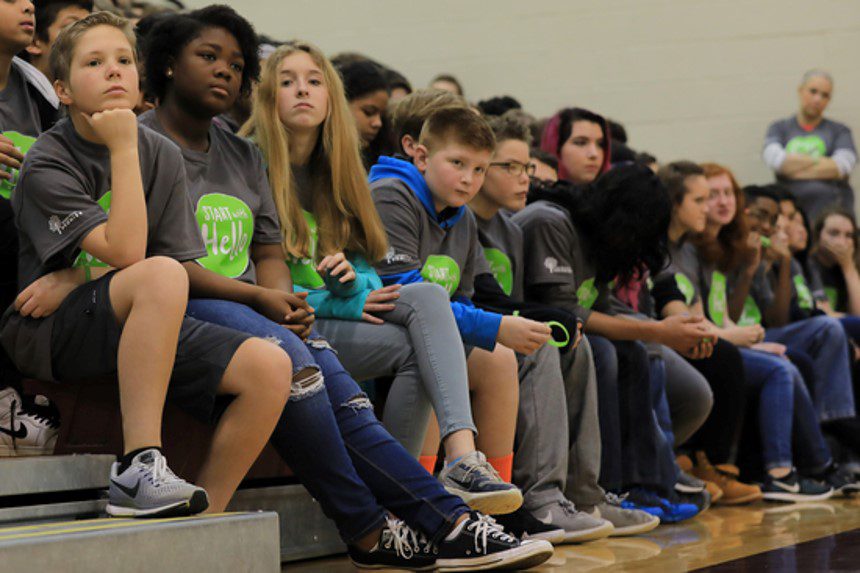 Students listen during an assembly that was held last as part of Start With Hello Week activities. Activities align with social emotional learning (SEL) and development.