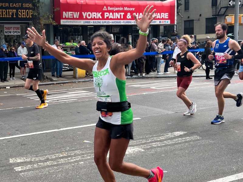 Rebecca Somer completing the NYC marathon with SHP.