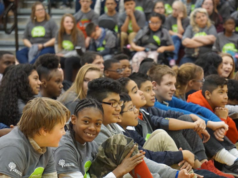 Group of students gather for an assembly. Helping to pass school violence prevention laws, many states have used our model school safety legislation.