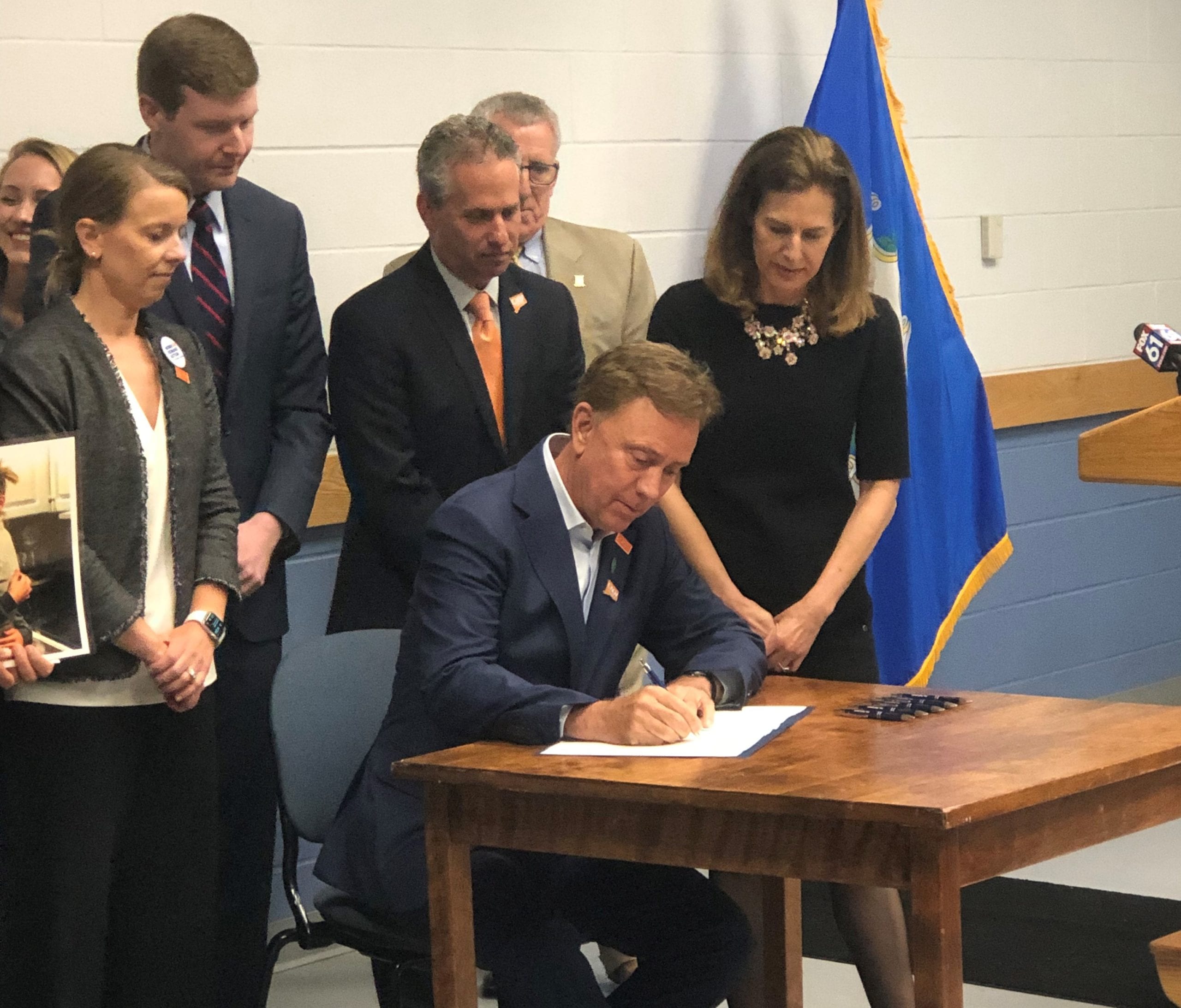 Governor Ned Lamont sign's Ethan's Law.